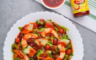 MIXED GREENS SALAD WITH FRESH FRUITS AND GRILLED SHRIMPS IN BANANA CATSUP VINAIGRETTE DRESSING