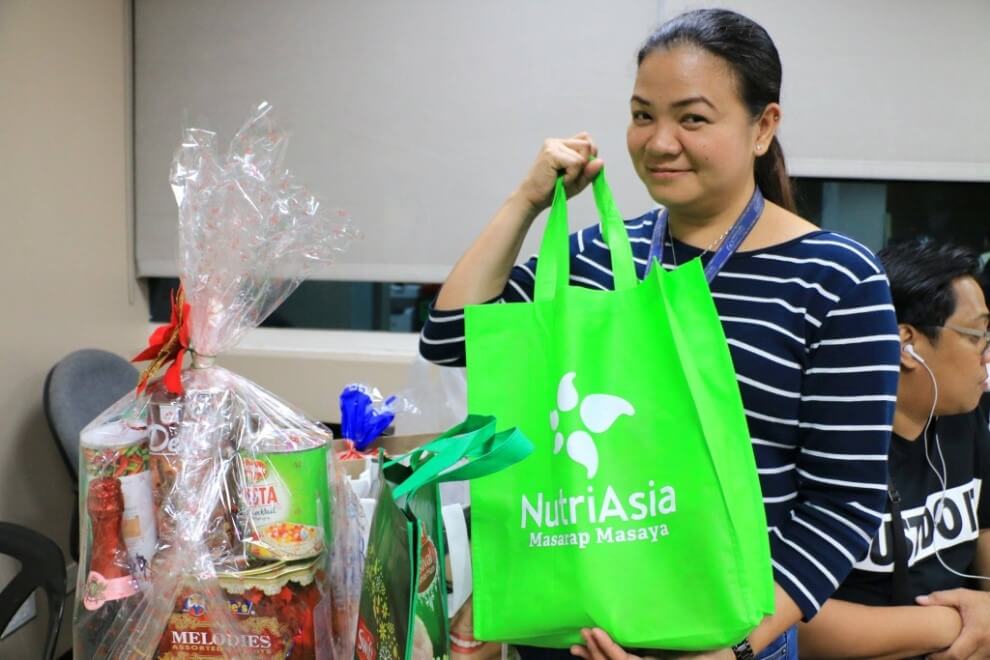 ABS CBN Employee with NutriAsia loot bag