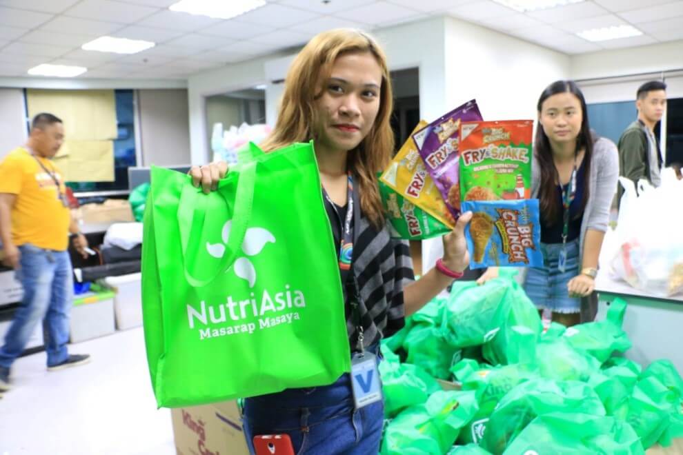 ABS CBN Employee with NutriAsia loot bag