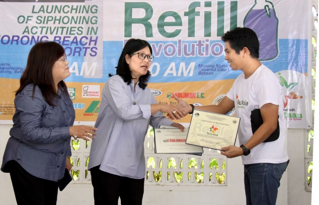 NutriAsia employee's receives a plaque of appreciation